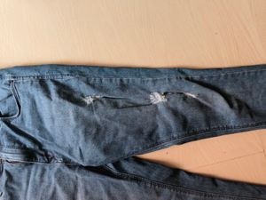 Distressed Denim Jeans