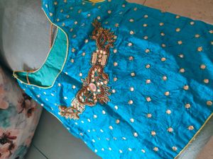 Lehengas with contrast choli and dual tone dupatta
