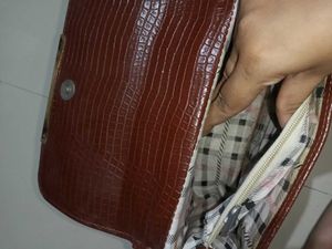 brown handbag crocodile pattern