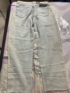 Ripped Jeans - Light Wash Denim