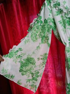 Green floral Print georgette Gown.