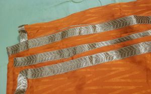 Orange dupatta with Silver Border