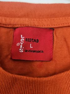 Vintage Levi&#39;s Orange Sleeveless Tee