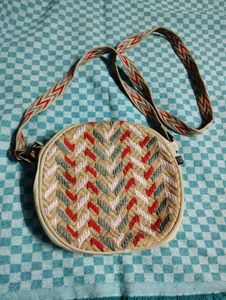 one sling bag and 1 lavie wallet....