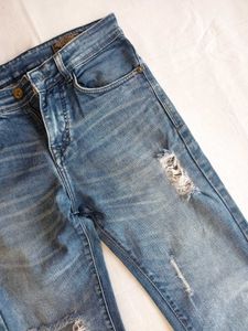 Distressed Blue Wash Denim Jeans