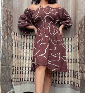 brown offshoulder with neck strip dress