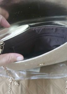 Stelatoes Golden Clutch