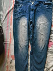 Distressed Blue Denim Jeans