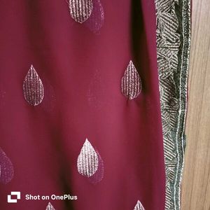 Heavy Zaria work, elegant maroon saree