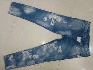 DKNY Ripped Jeans.