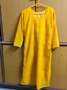 Limited Period Offer !!!Yellow Embroidered Kurti