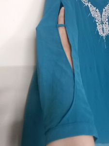 New Teal Tunic, pattern sleeves white embroidery