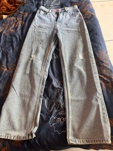 Ripped Light Wash Denim Jeans