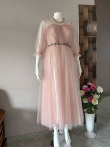 Pink stone studded tulle gown