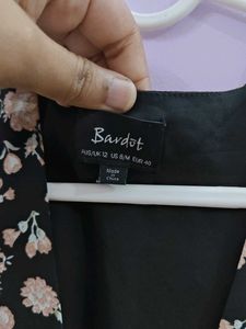 a black floral tie up dress