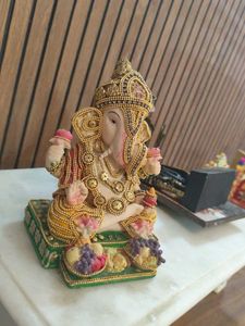 Ganesha Statue with Fruit Offerings