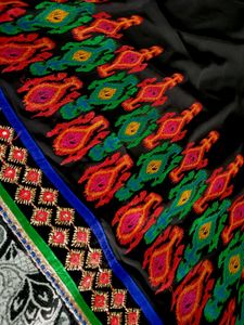 Elegant Black And Red Saree