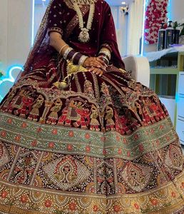 Maroon Velvet Bridal Saree with Jewelry