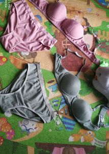 Two matching bra and panty sets