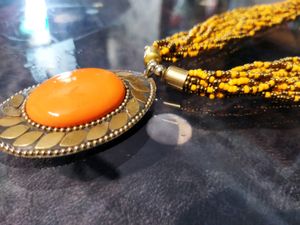 Partywear Pendant Set In Orange Nd Yellow Colour C