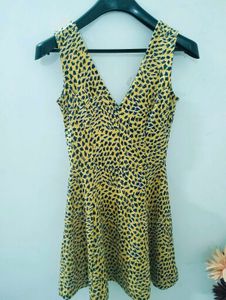 H&amp;M yellow and Black animal print skater dress.