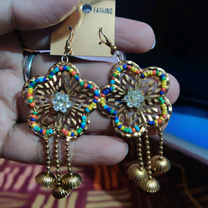 unused  long hanging earings