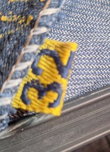 Navy blue denim with light white patch