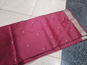 Elegant burgundy Saree with silver border
