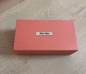 Prada (MiuMiu) Sunglasses