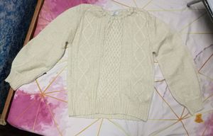 creame coloured sweater