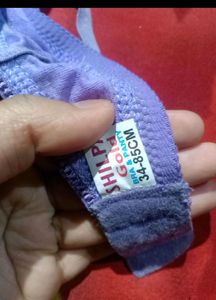 UNUSED PURPLE BRA. PADDED. SIZE 34