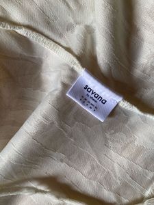 🦢Savana ruffle tie top