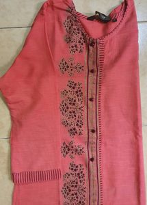 Dark peach color top with foil prints in the middle