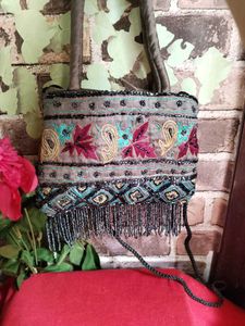 Embroidered Handbag with Moti Tassels