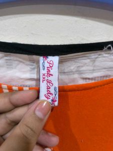 Oraange Boat Neck Kurti.