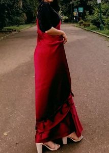 HOT RED SATIN SAREE WITH BLACK VELVET BLOUSE .