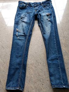 Ripped Blue Denim Jeans