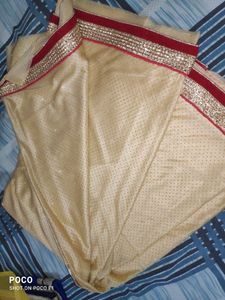 pretty red golden saree.
