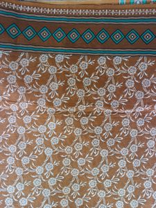 Pure Cotton Saree, In Daek Brown Colour. Best Quality And Not Used Before. Comes With Blouse Piece