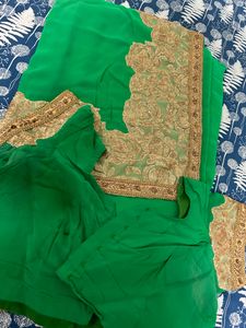 a green with golden heavy work