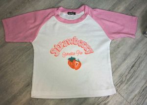 cute white baby tee w pink graphic