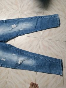 Distressed Denim Jeans