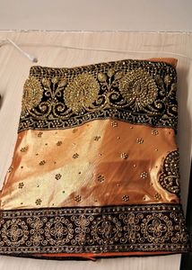 Shimmery Orange Sari With Stone Work