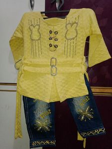 Denim Jeans With Yellow Top.
