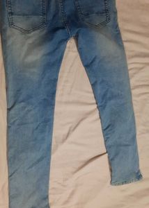 Light Wash Distressed Denim Jeans