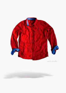 Red Shirt with Blue Accents