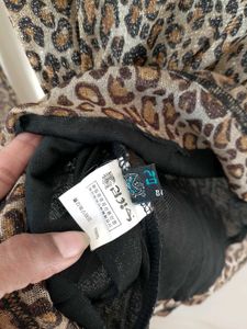 leopard print turtle neck mesh top.