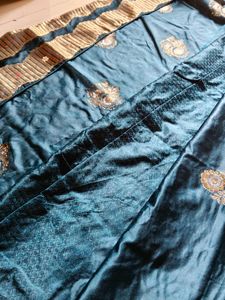 Elegant Teal Embroidered Saree