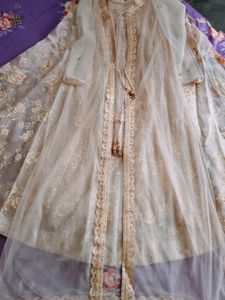 Lehenga With Net Full Sleeve Jacket And Blouse