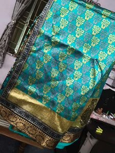 Elegant Teal & Gold Saree